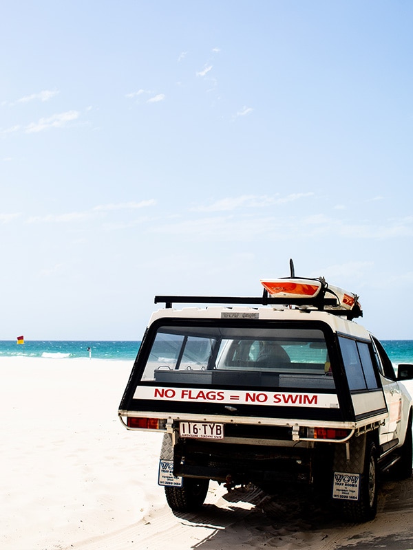 Surf lifesaving truck on beach