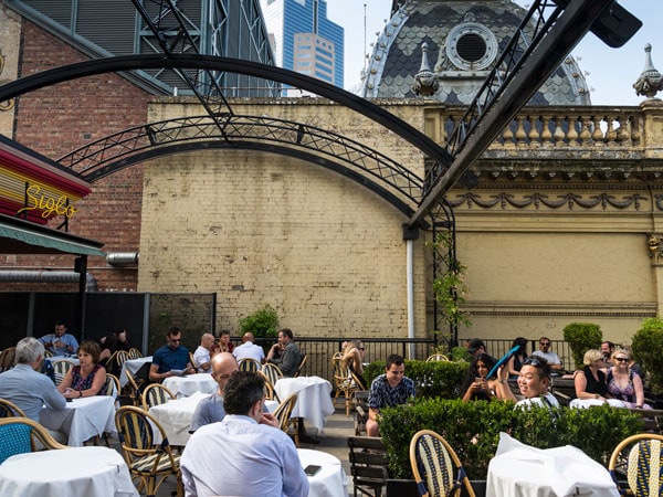 people dining at the rooftop bar at Siglo bar in Melbourne, CBD