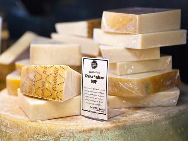 a stack of cheese at The Smelly Cheese Co., Adelaide Central Market
