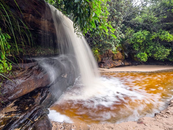 a beautiful waterfall in Collins Flat Beach, Manly