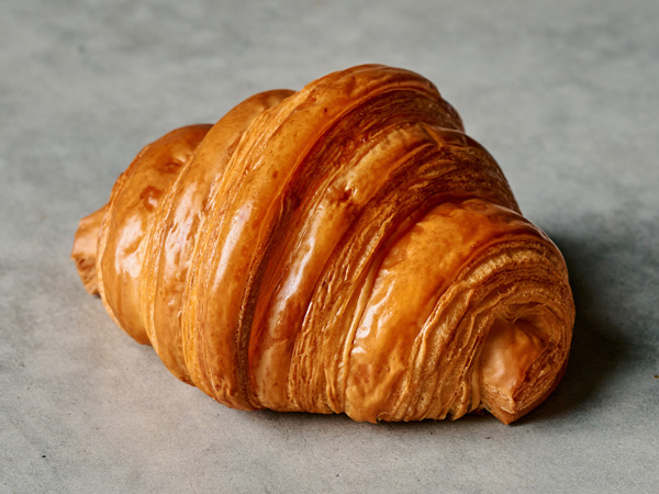 a traditional croissant at Lune Croissantarie 