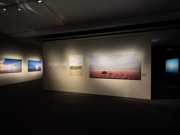 art displays inside the dimly-lit Museum of Australian Photography (MAPh)