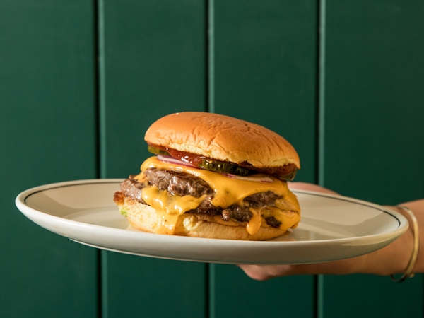 a burger on a plate at Mabels, Toorak