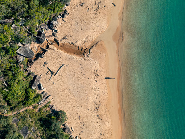 a man enjoying the sun from Resolute Beach in Ku-ring-gai National Park