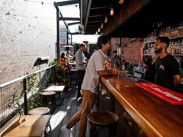 a man ordering a drink at Union Electric Bar