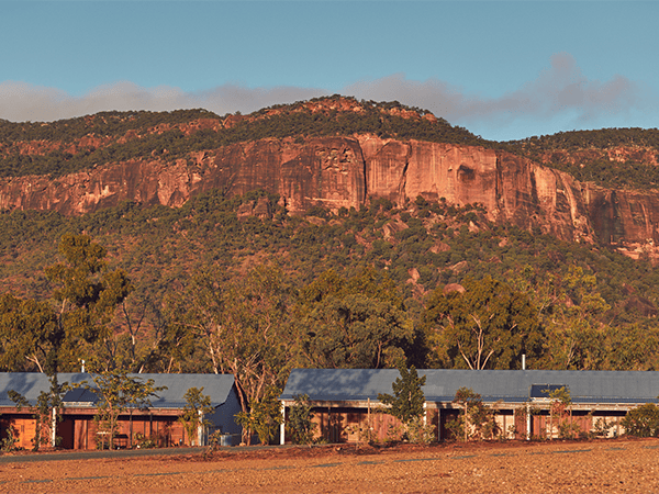 Mount Mulligan Lodge with the Mount Mulligan backdrop.