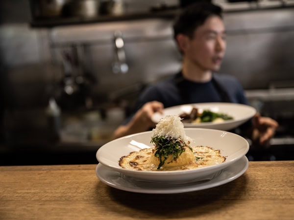 a plate of food on the table at Birdie Noshery and Drinking Establishment