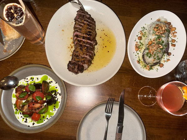 a table-top view of dinner plates at The Schoolhouse Restaurant at The Union Bank, Orange