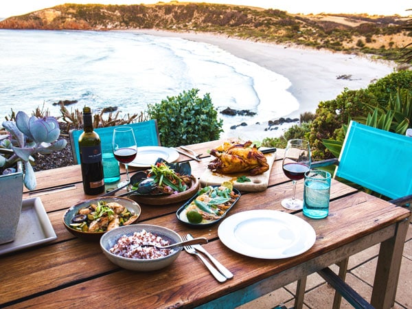 Food on the table at The Cliff House overlooking the ocean.