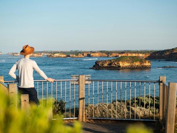 a man admiring the view on the Bay of Islands