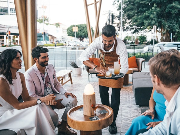 friends enjoying cocktails at CC's Bar & Grill at Crystalbrook Bailey