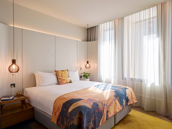 a stylish and luxe bedroom at Crystalbrook Kingsley