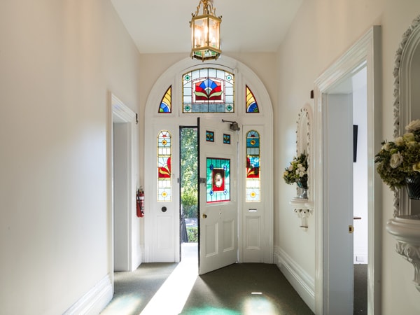 The front door with stain glass windows at The Florance. 