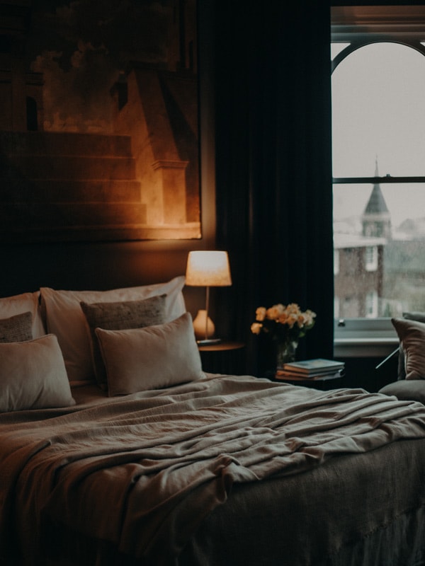 The bedroom at Wahroonga, with window and low light.