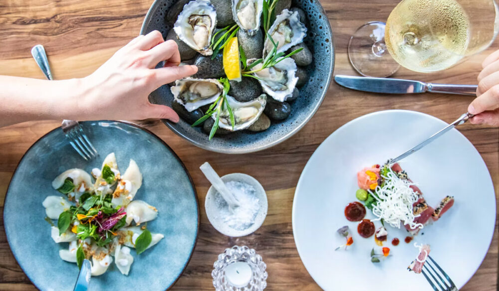 share plates on the table at Melaleuca, Port Douglas