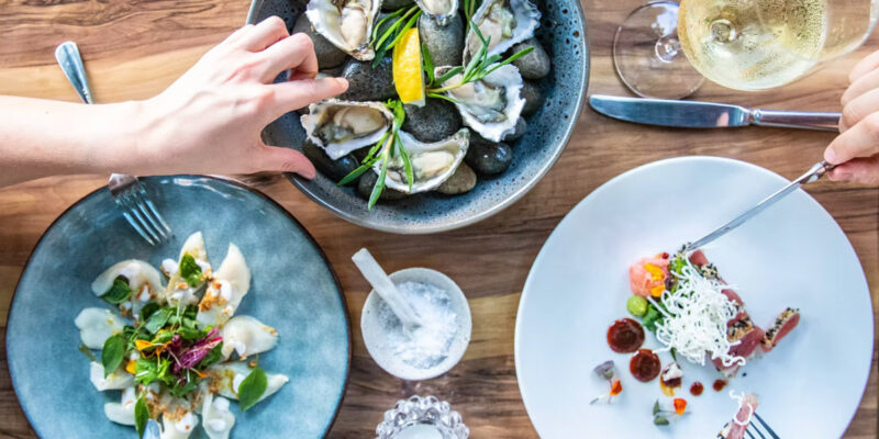 share plates on the table at Melaleuca, Port Douglas