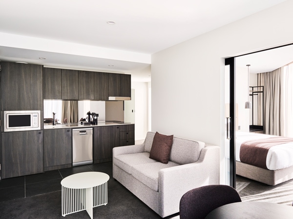living and dining areas at Abode Hotel Canberra