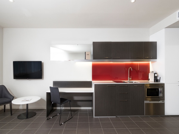 the kitchen inside Abode Hotel Canberra