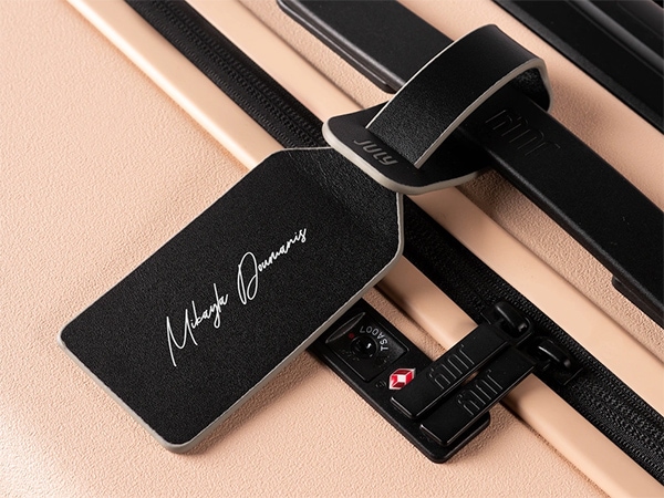 July luggage tag.