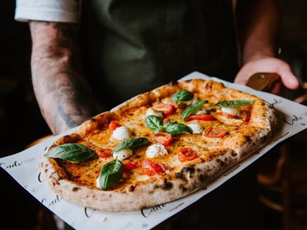 a close-up shot of pizza at Cade Kitchen and Bar, Mudgee