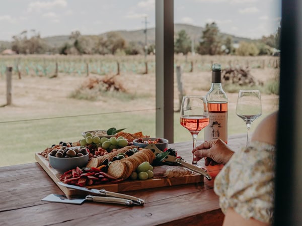 enjoying wine and charcuterie platter at Farmers Quarters, Mudgee
