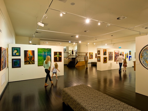 a mother and her daughter wandering inside Riddoch Art Gallery, Mount Gambier