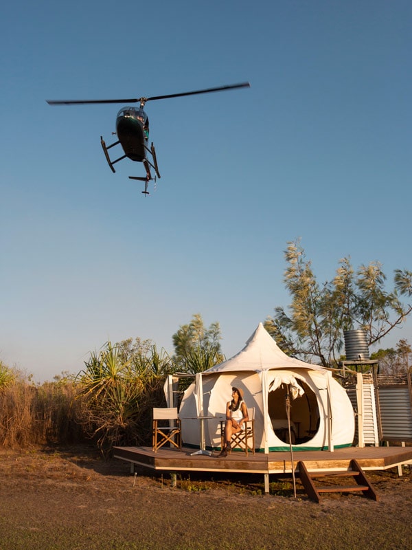 a helicopter above a glamping tent at Top End Safari Camp