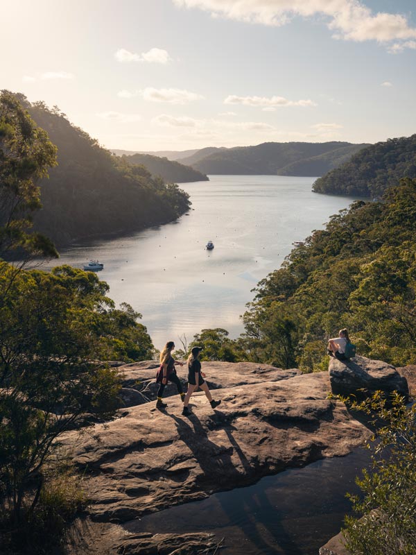 Friends enjoying the scenic views across America Bay and Cowan Creek from the America Bay Walking Track, Ku-ring-gai Chase National Park.