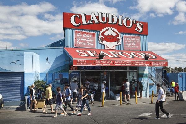 people outside Claudio’s Seafoods, Sydney Fish Market