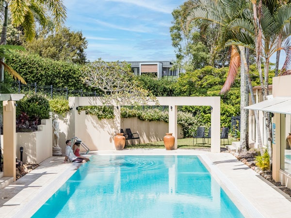 an outdoor pool at Noosa Springs Golf and Spa Resort