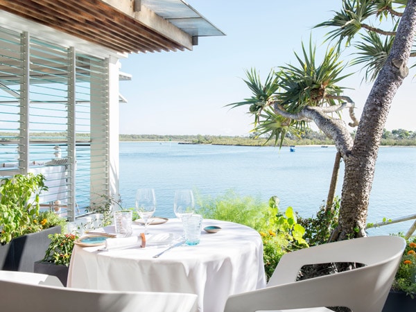 Table overlooking Noosa River at Ricky's River Bar and Restaurant