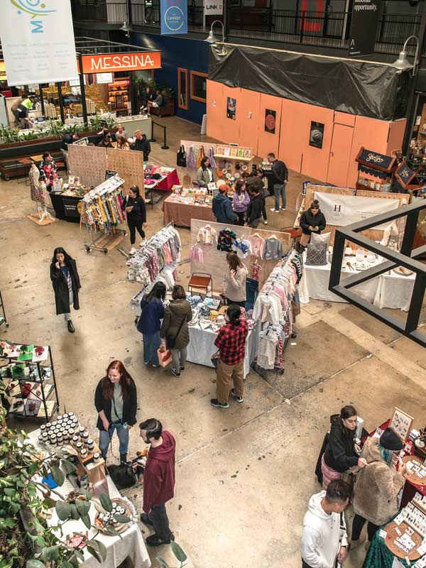 People browsing the market at The Cannery