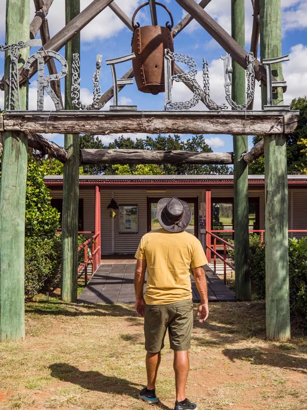 a man stopping by the True Blue Visitor Centre