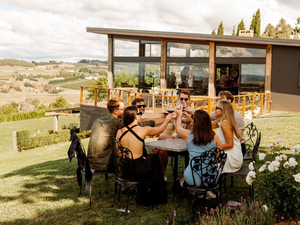 friends enjoying a wine-tasting session at Borrodell Estate