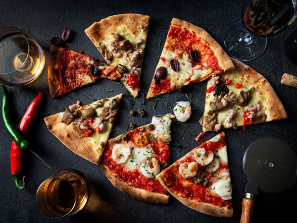 slices of pizza at Agostini’s, Canberra