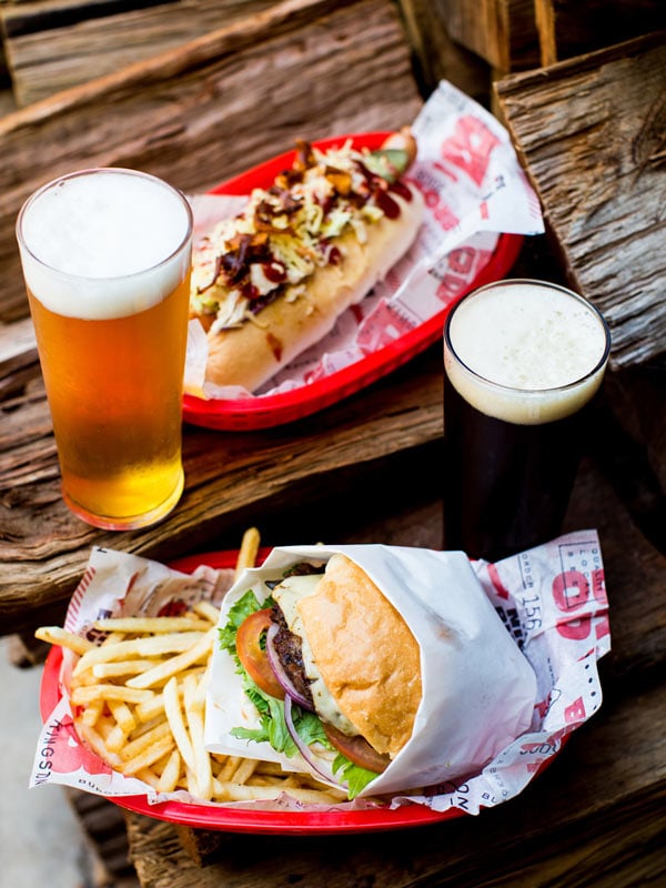 a table-top view of flame-grilled burgers at Brodburger @ Capital Brewery, Canberra