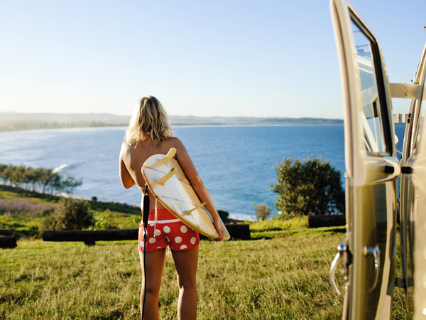 a surfer heading to the beach, Lennox Head