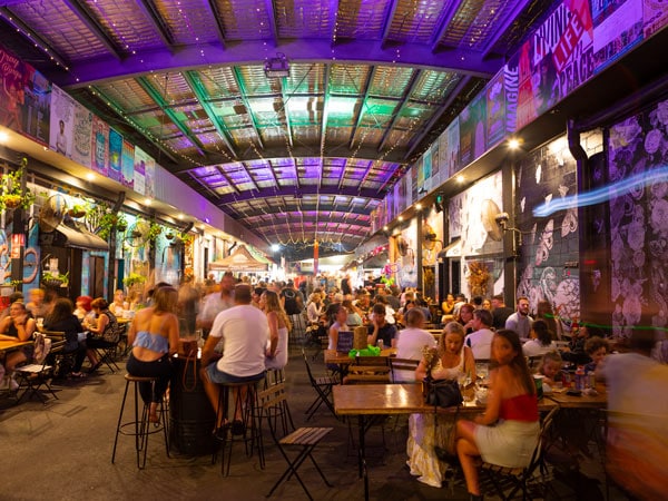 an indoor dining filled with people at Miami Marketta