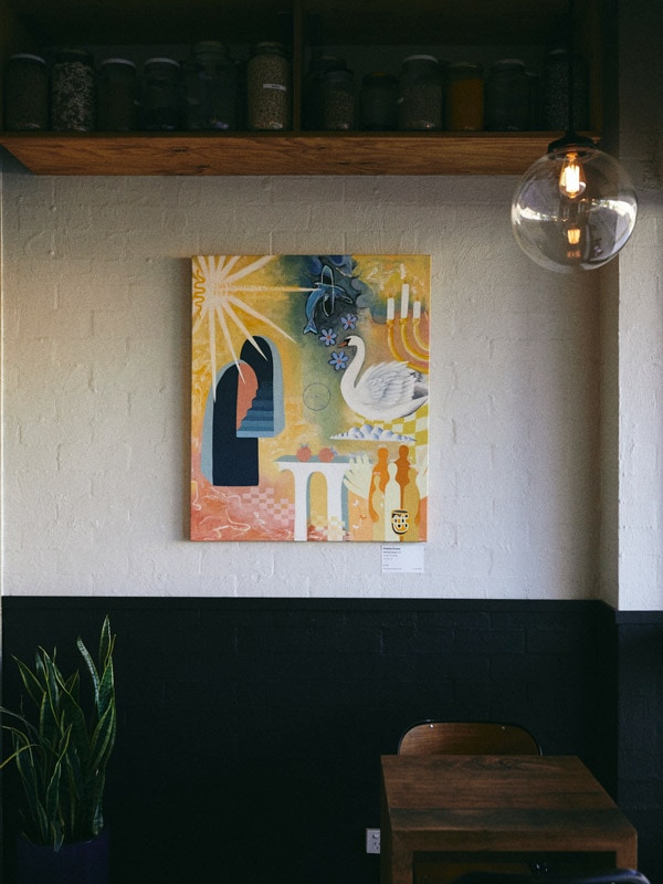 a painting on the wall at Punch And Daisy cafe, Byron Bay