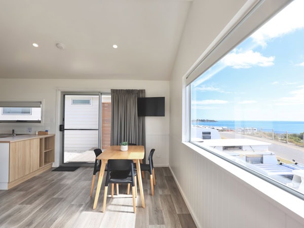 a beach shack with ocean view at the Sea Vu Caravan Park