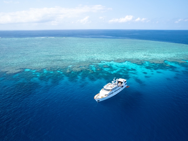 the Spirit of Freedom cruising along the Great Barrier Reef