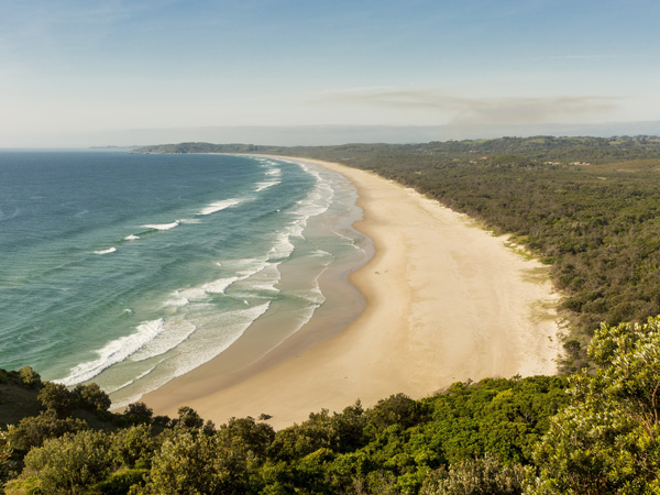 a scenic view of the Tallow Beach from above