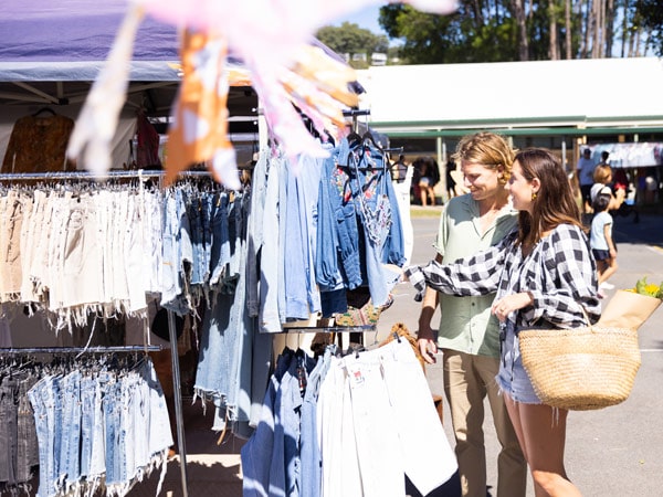 two women choosing what clothes to buy at The Village Markets