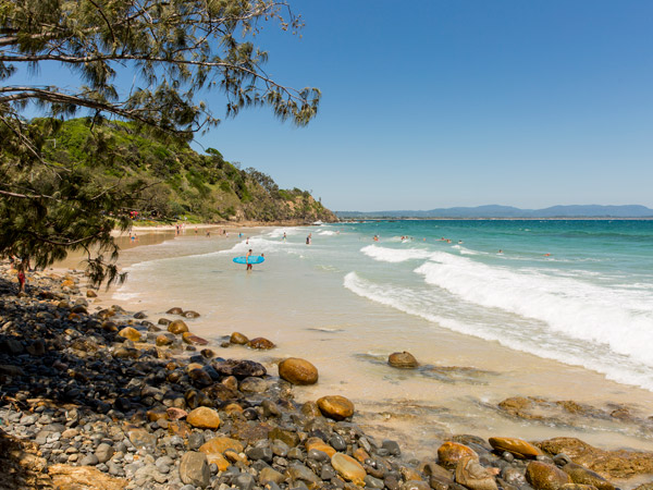 surfing at Wategos Beach, Byron Bay