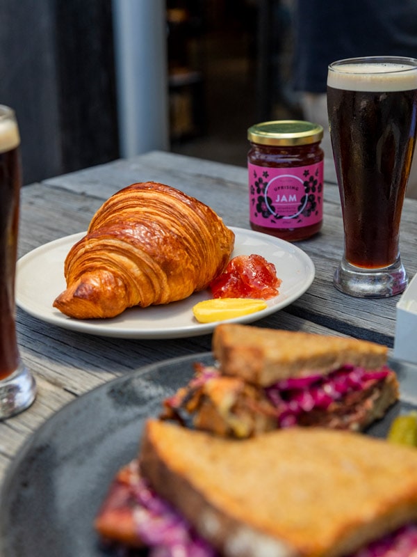 croissant and coffee at Baked Uprising, Newcastle