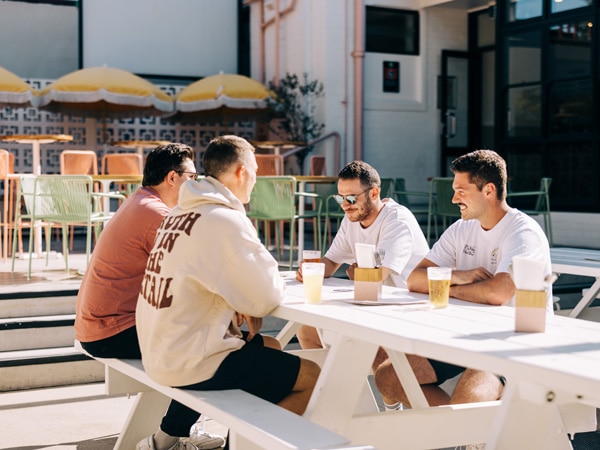 a group of men drinking at the al fresco spot in The Bennett Hotel, Newcastle