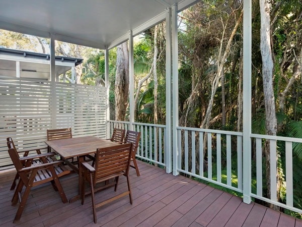 a cabin's verandah at Emerald Beach Holiday & Caravan Park