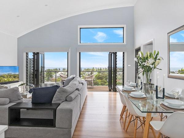 the living and dining interior at La Terrasse Kiama