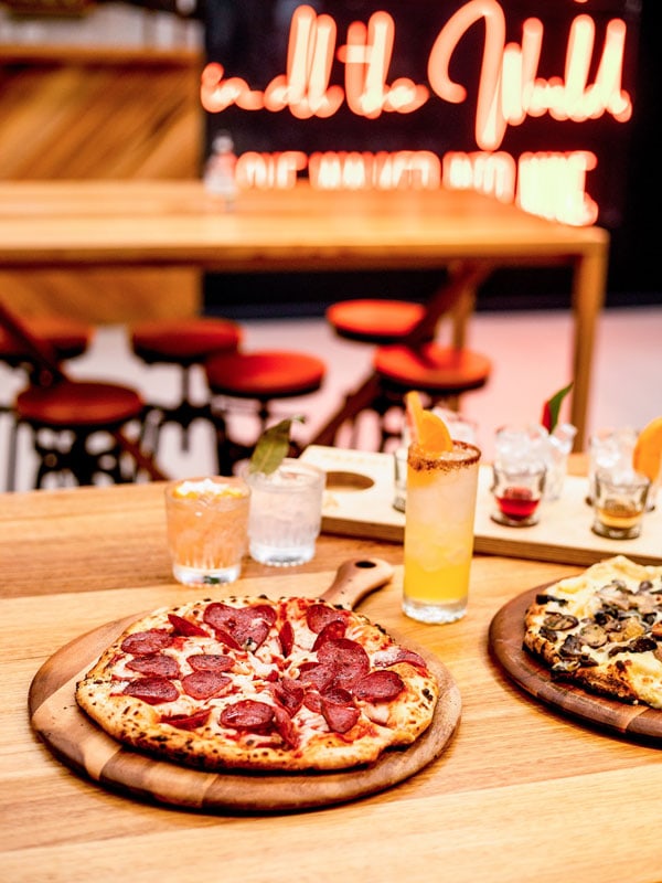 wood-fired pizza at Parrot Pizzeria in The Aviary