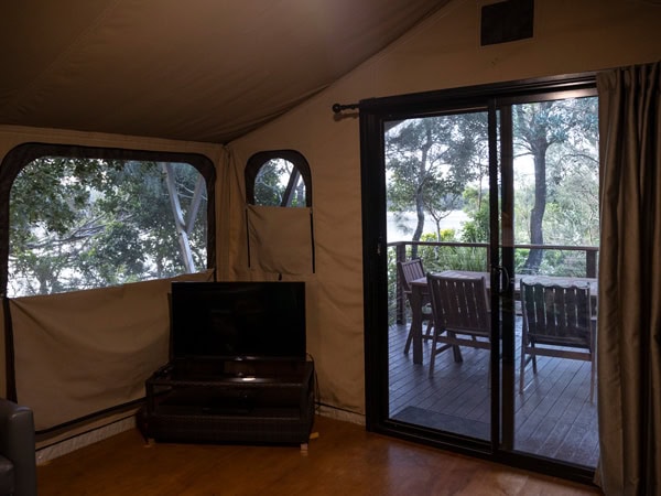 a look inside the tent at Reflections Red Rock Holiday & Caravan Park